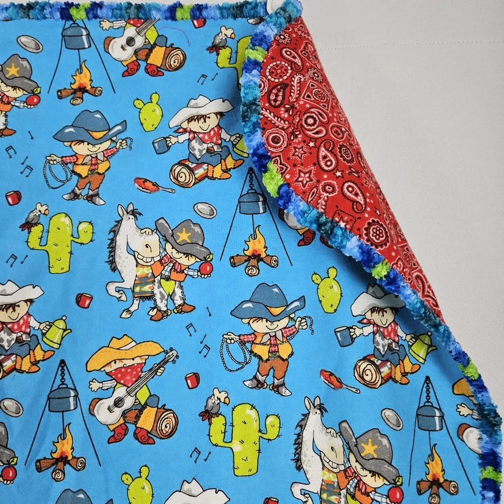 Handmade cowboy baby blanket with embroidered edges 42